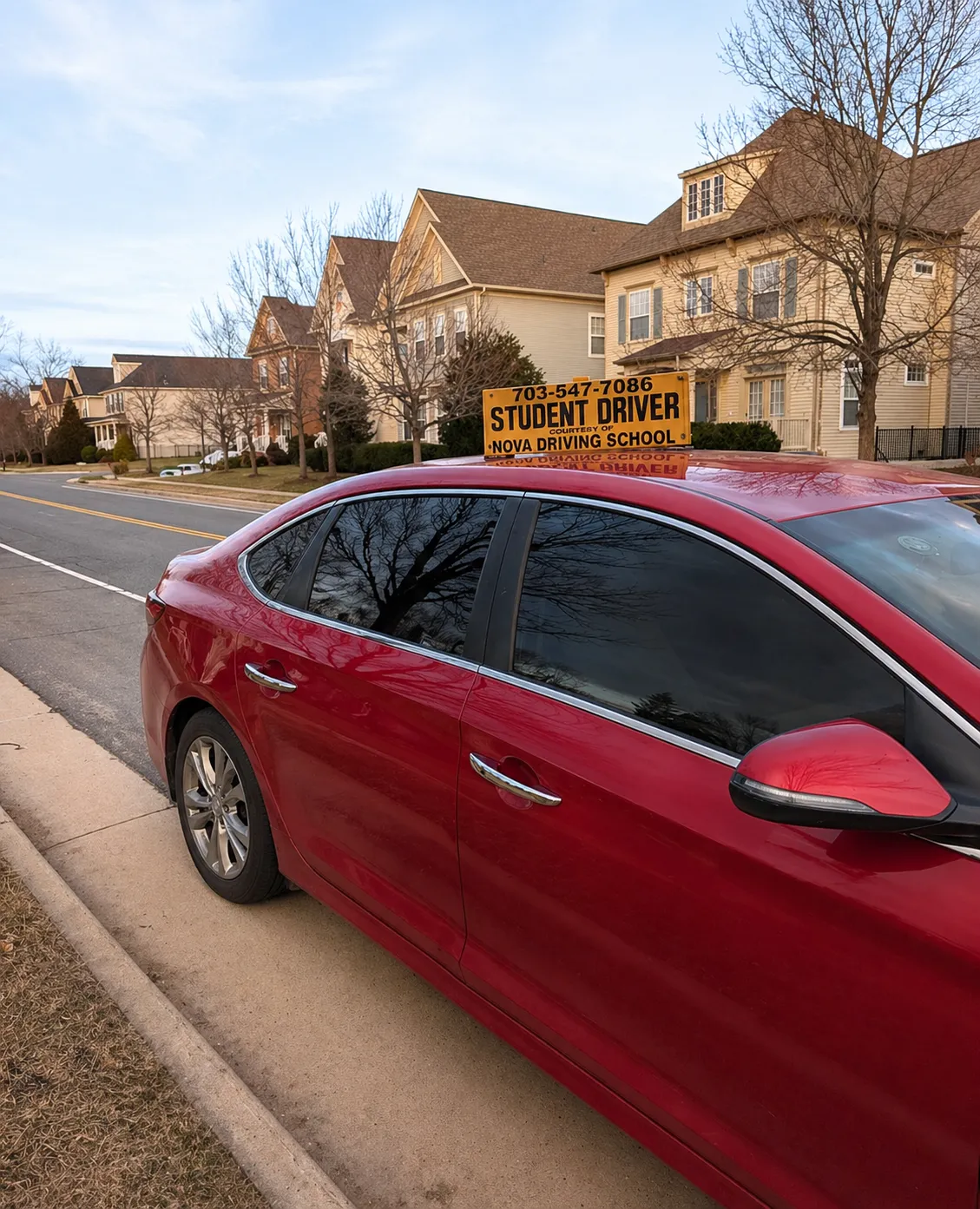 Farooq and his wife at Nova Driving School